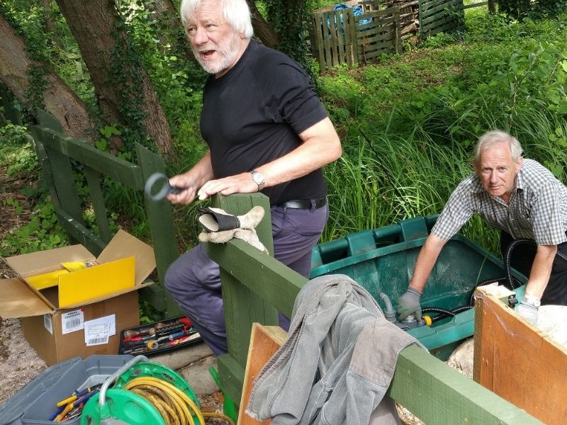 Setting up pump at borehole.