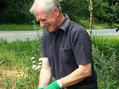 Volunteers clearing the land.